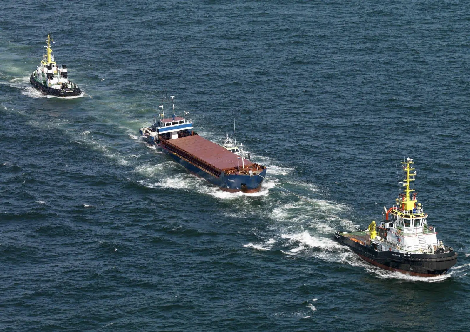 The ‘Janina’ under tow by Multraship tugs, July 2010 (Sky Pictures)