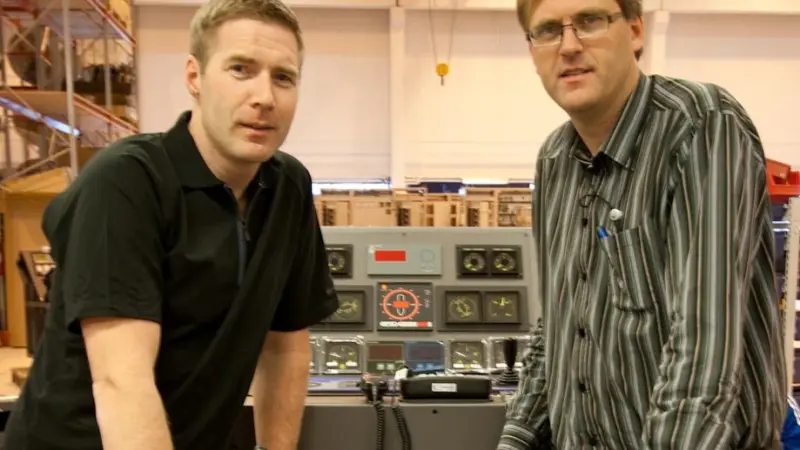 Arne Ove Rødstøl and Gunnar H. Hide at UPC with a modular bridge console under production