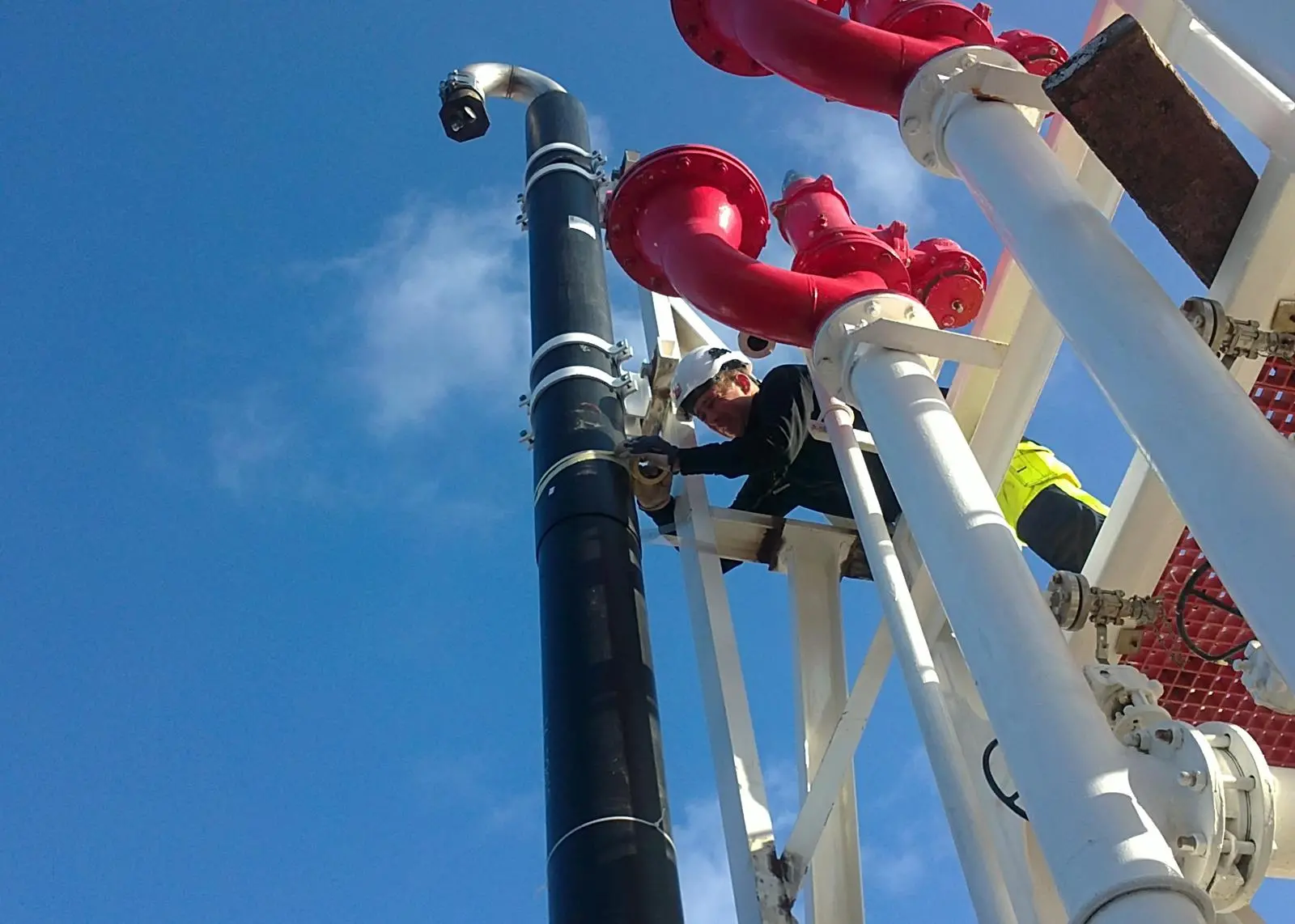 Mittel engineers install the connection pipes on the 'Bit Viking'
