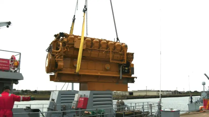 Finning cranes off a Caterpillar engine from a HM Border Force patrol craft