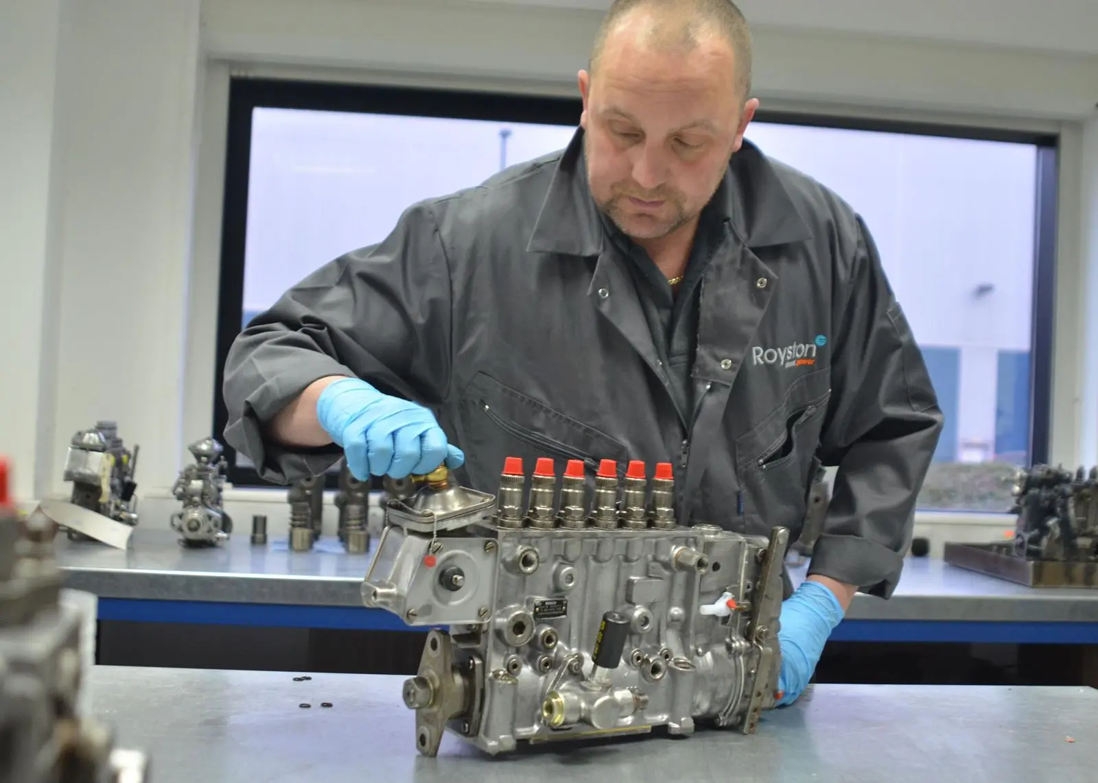 Royston engineer overhauling the fuel injection equipment