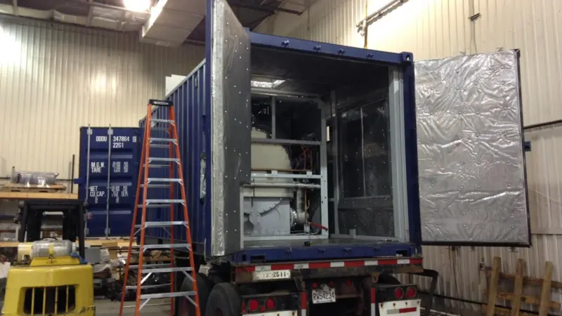 the STEP system being installed in a container ready for the shipboard trials