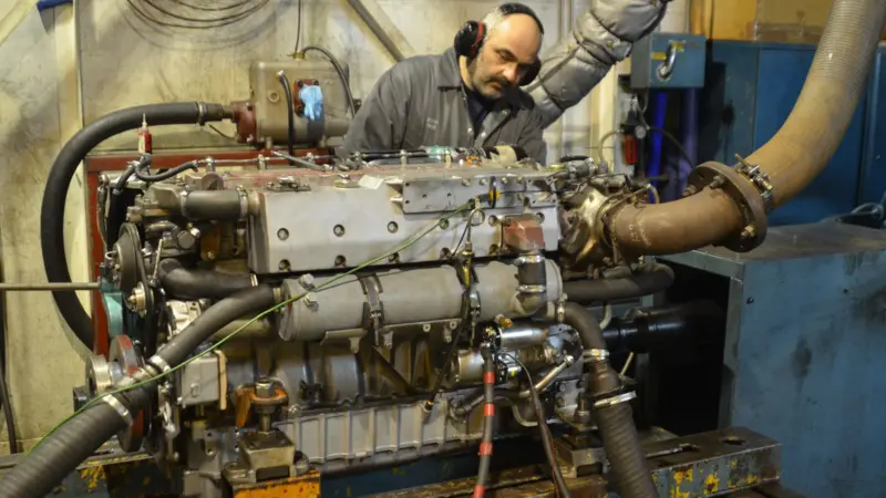 An overhauled engine is given a test run in the Royston workshop