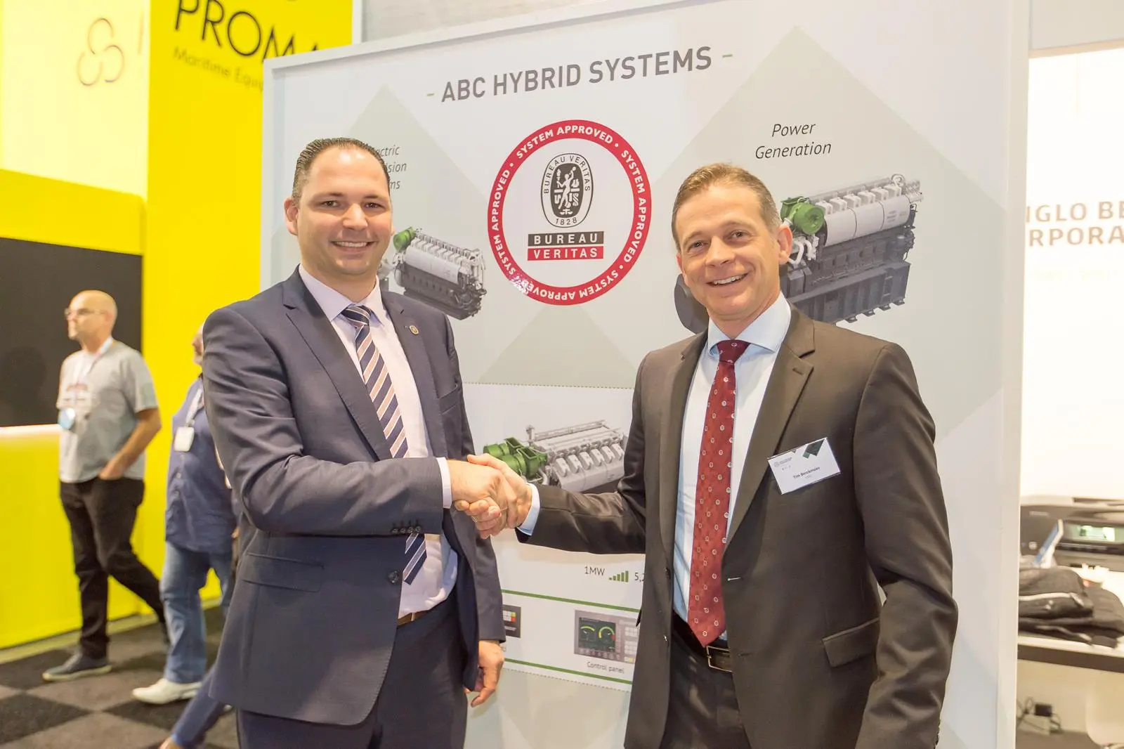 Rik De Petter, marine & offshore chief executive, Bureau Veritas Belgium & Luxembourg (left) hands over approval and certification to Tim Berckmoes, CEO of Anglo Belgian Corporation