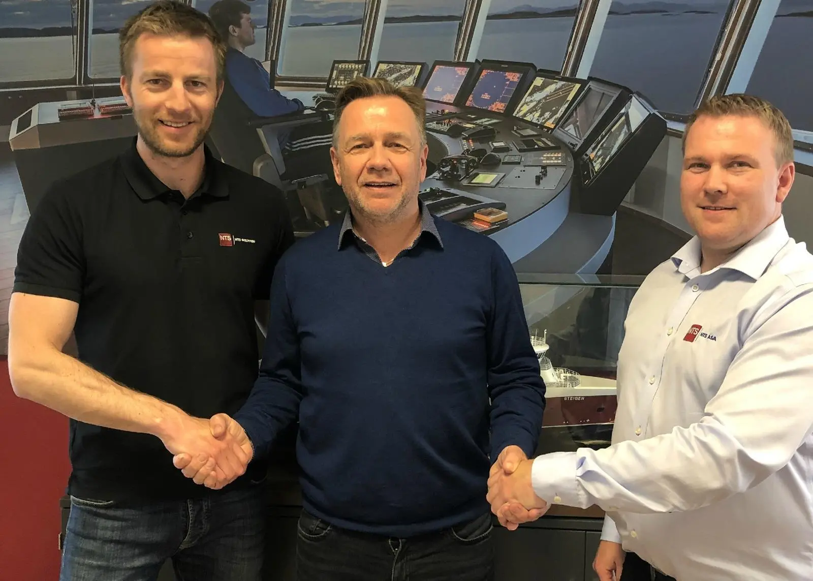 Shaking on it: Dagfinn Eliassen, Market and R&D Manager of NFT, Geir Johan Bakke, CEO of Havyard Group and Oddleif Wigdahl, CEO of NFT. (Credit: Havyard Group).