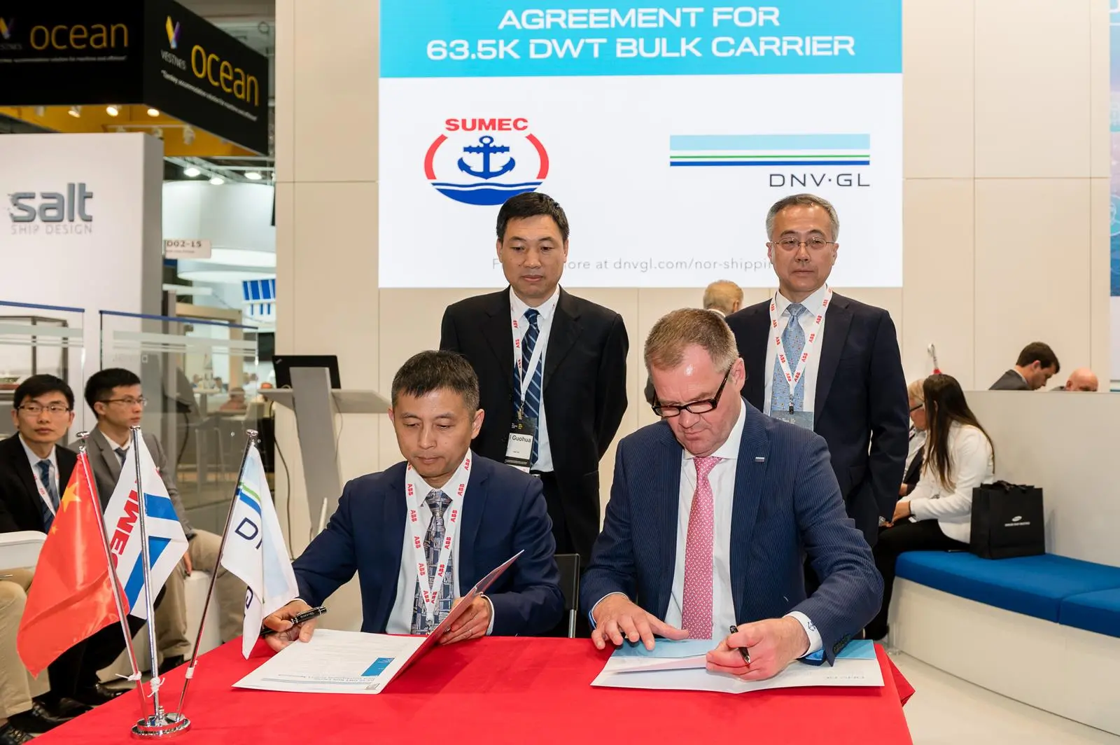 Mr Xu Bin, General Manager of New Dayang Shipbuilding Co., Ltd. (left), and Norbert Kray, DNV GL’s Regional Manager Greater China, signed the JDP at DNV GL's Nor-Shipping stand.