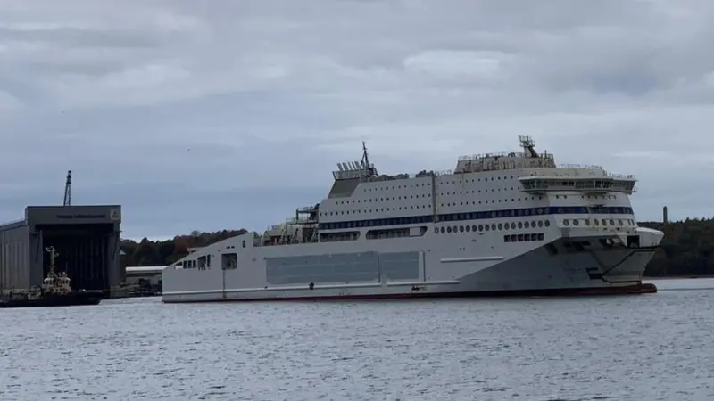 Unfinished Honfleur leaves FSG under tow for completion in Norway (Photo FSG)