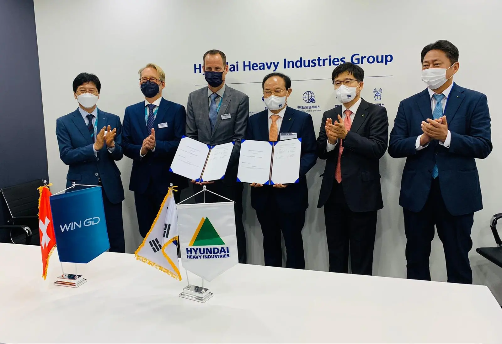 Signing ceremony hosted by HHI-EMD President & Chief Operating Officer Kwang-hean An and joined by WinGD’s Executive Vice President, R&D Dominik Schneiter and Executive Director Sales, Volkmar Galke