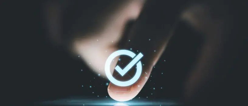 Digital image of finger pressing a tick