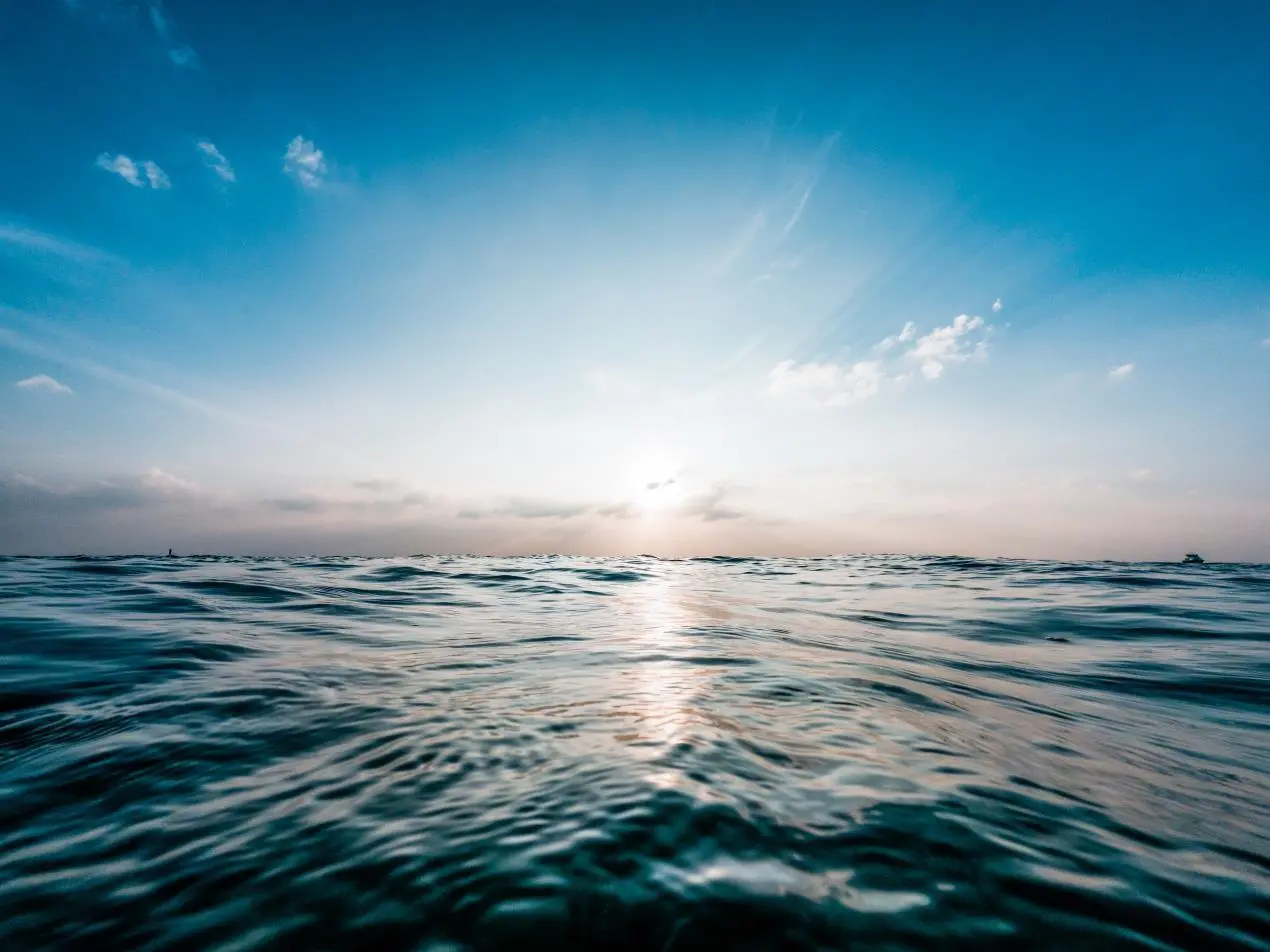 seascape with blue sky and sun