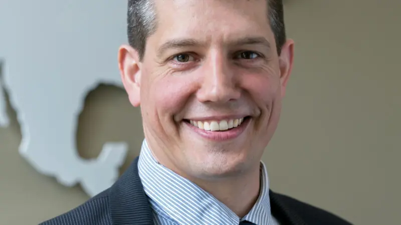 Dr. Andreas Schmid