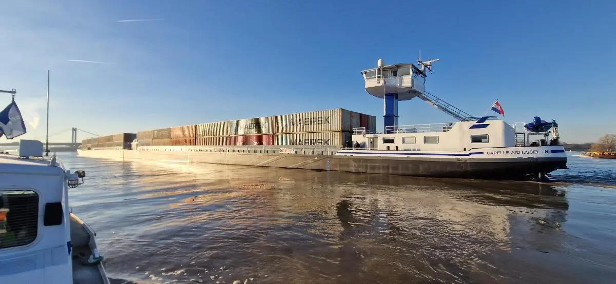 Mannheim inland cargo vessel loaded with Maersk containers