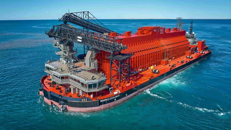 The photo shows “MinRes Coolibah” and “MinRes Airlie” commenced transhipping operations in May 2024