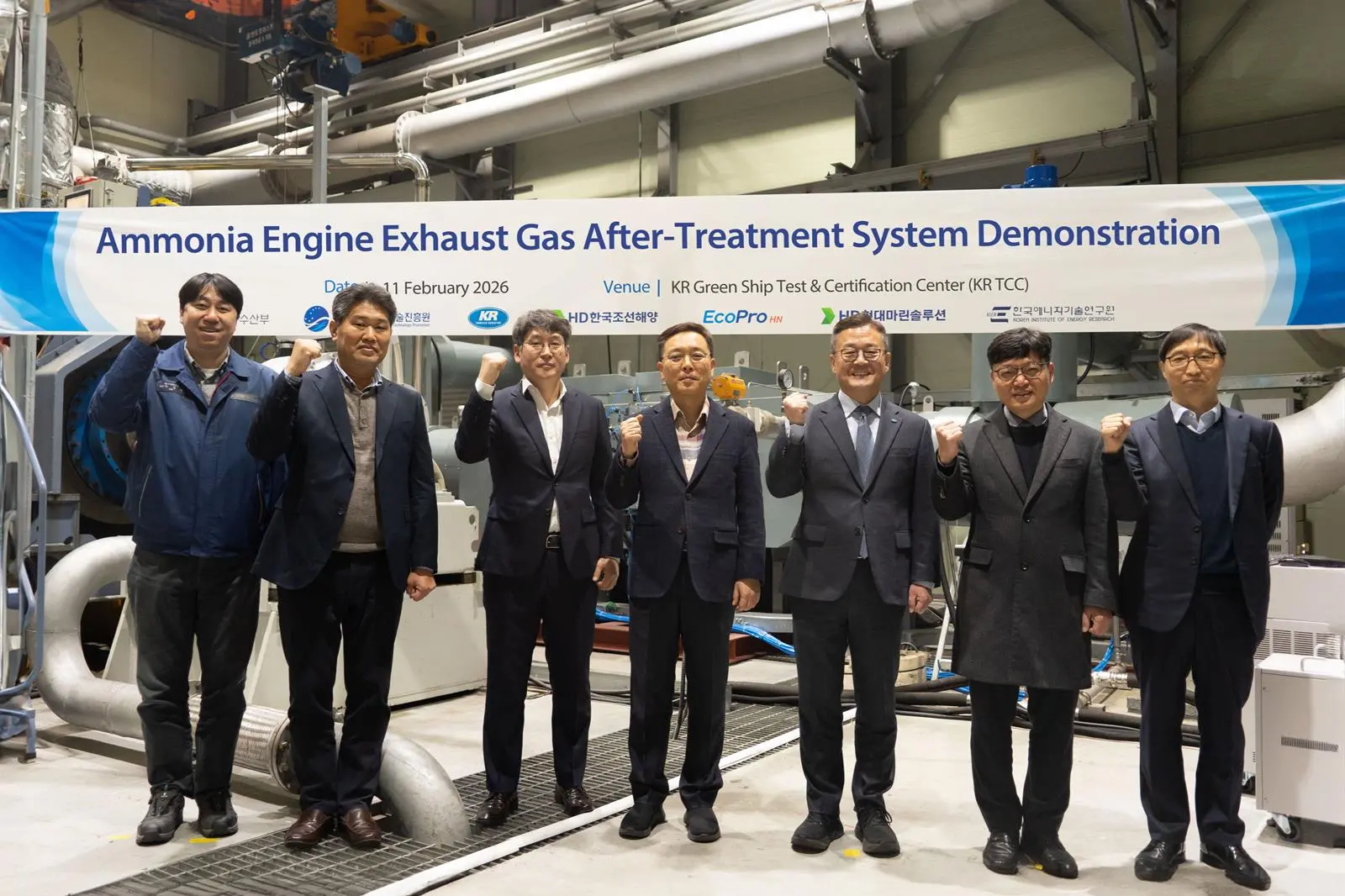 A photo of the development partners smiling for the camera
