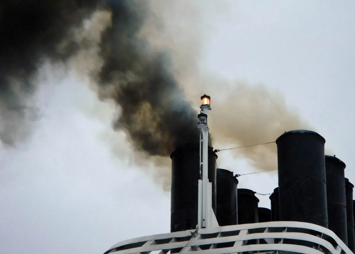Ship emitting black smoke